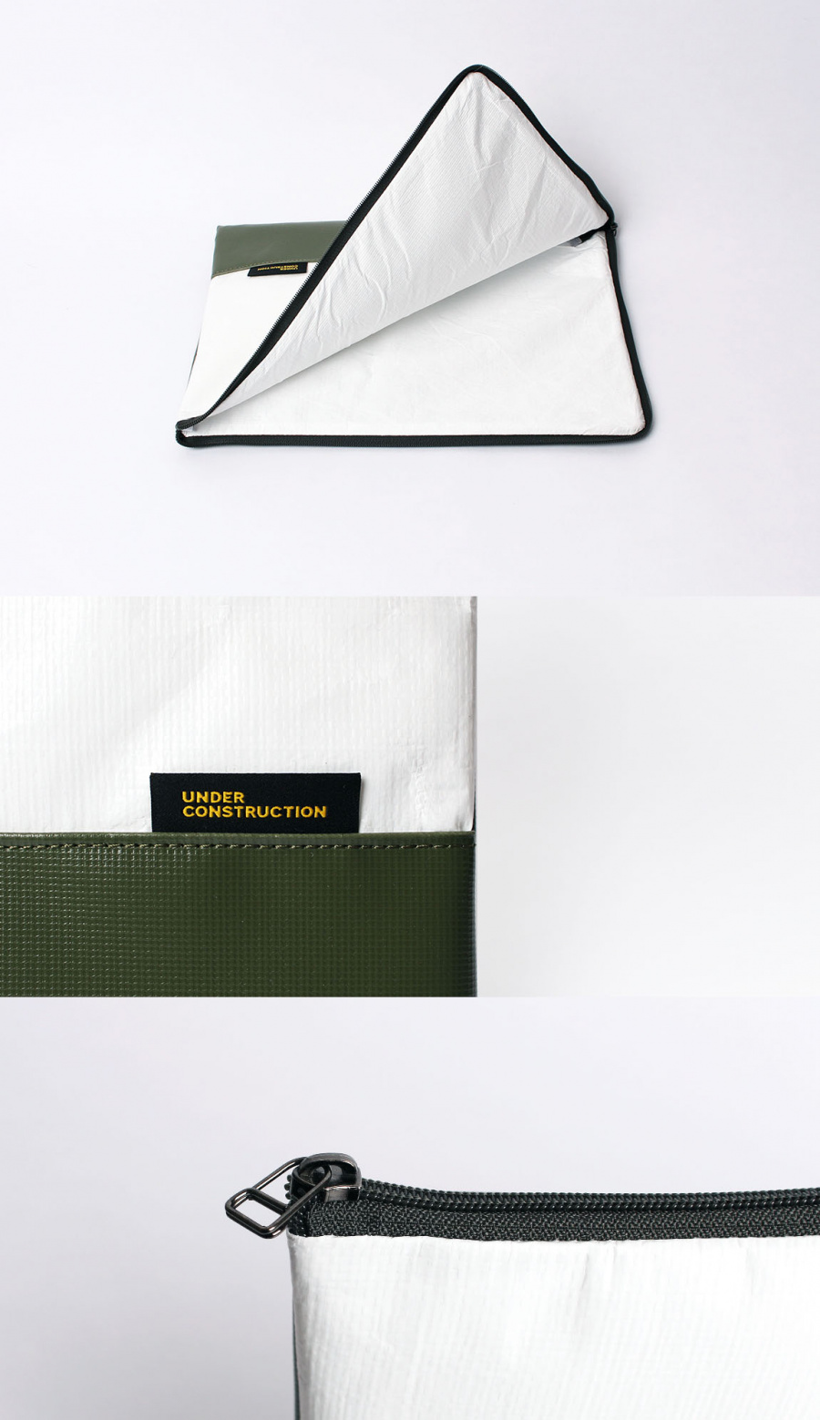 언더 컨스트(UNDER CONST.) 노트북파우치 카키