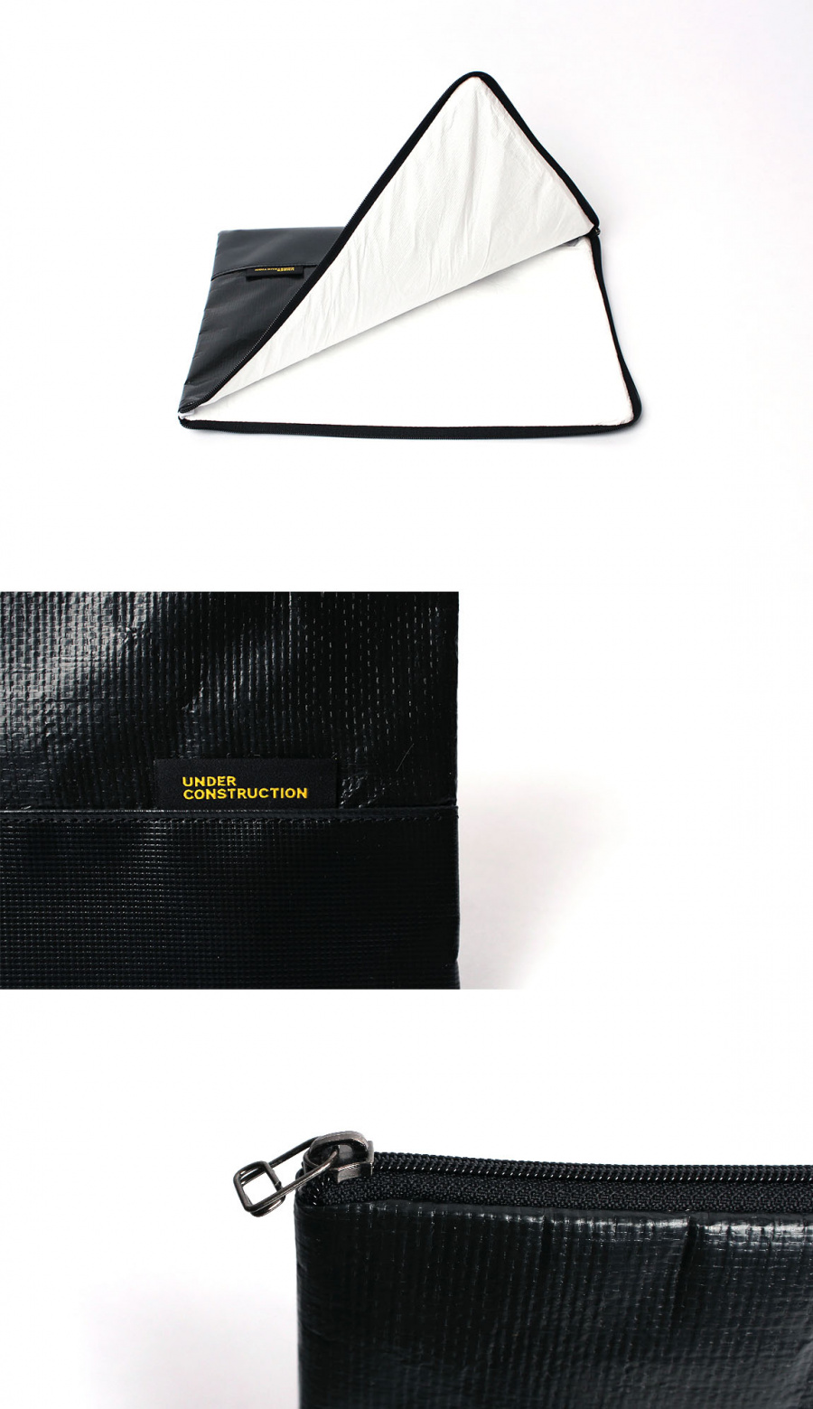 언더 컨스트(UNDER CONST.) 노트북파우치 블랙