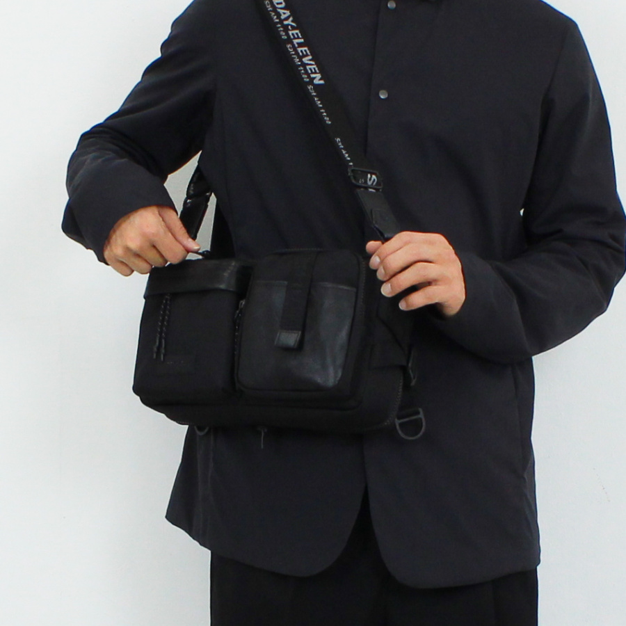 세러데이일레븐(SATURDAY ELEVEN) 리엑스크로스 슬링백 블랙