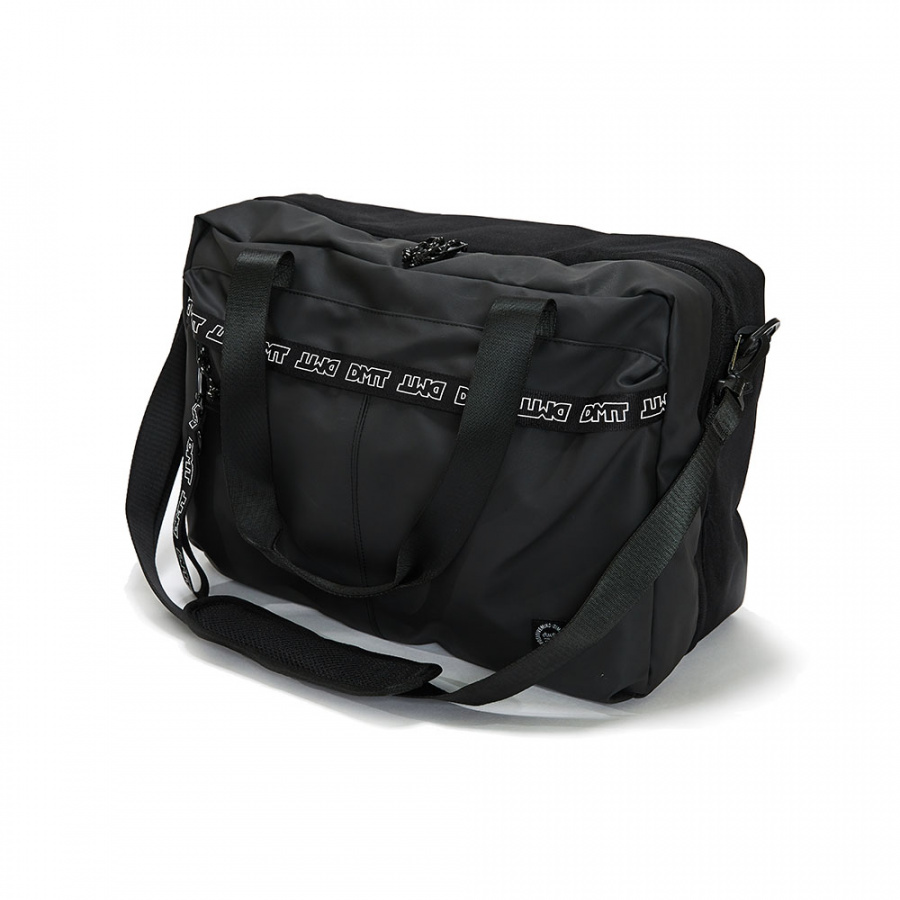 디엠티_피에스티브이엠(DMT_PSTVM) LOGO TAPE TRAVEL BOOTS BAG CROW BLACK(TPU)
