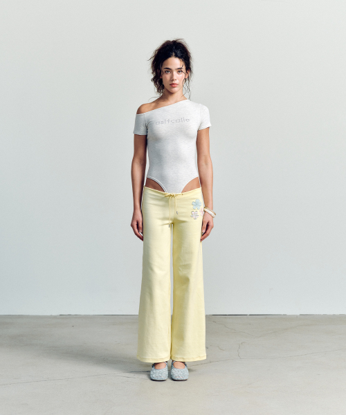 FLOWER APPLIQUE BOOTCUT PANTS YELLOW