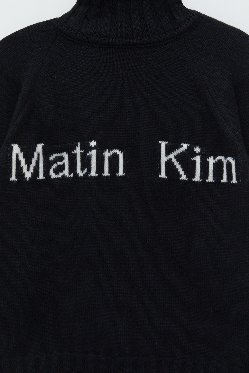 MUSINSA | MATIN KIM SPELL POINT KNIT ZIP UP IN BLACK