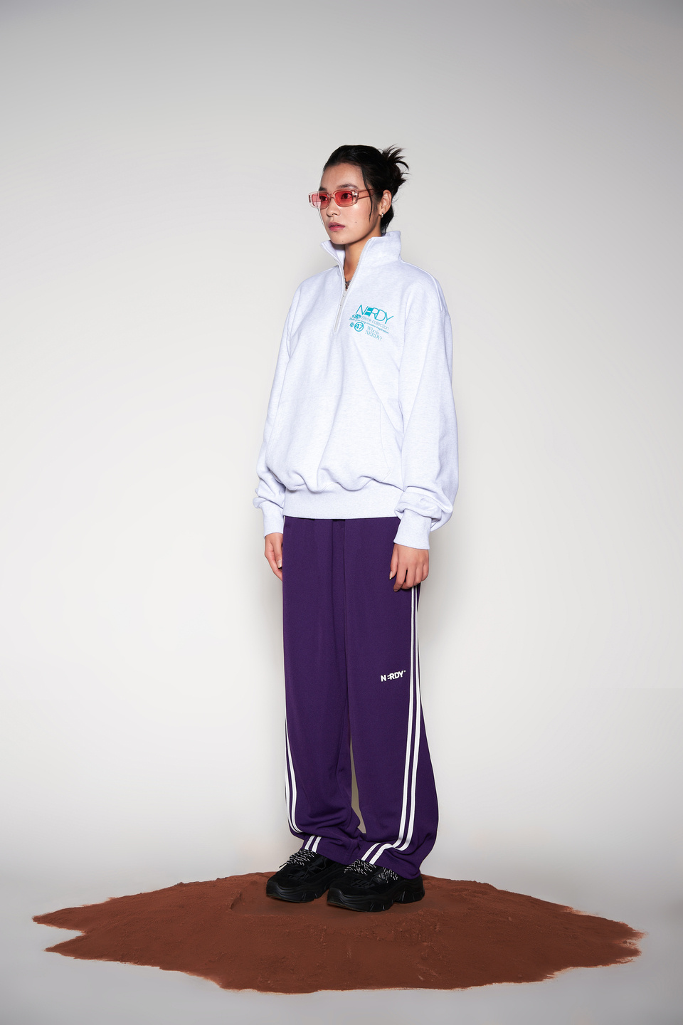 MUSINSA | NERDY Curved Wide Track Pants Dark Purple