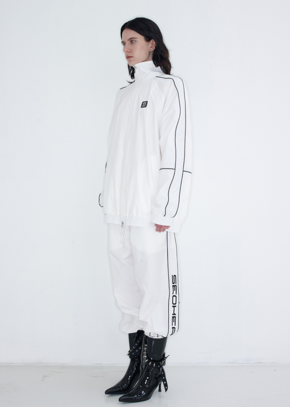 MUSINSA公式 | s/e/o PIPING LINED NYLON PANTS IVORY