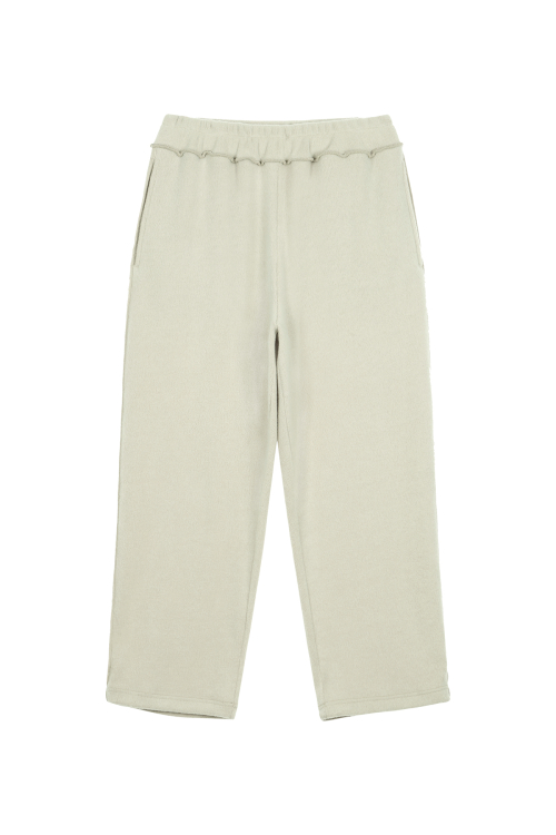 SMOOTH D LOGO KNIT PANTS IN ASH BEIGE
