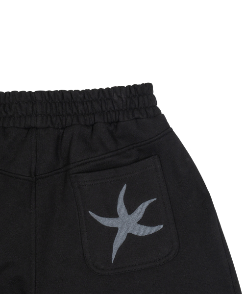 TCM back logo half sweat pants (black)