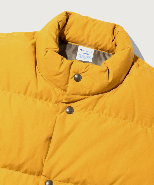 헤리티지 C로고 푸퍼 다운 베스트 Mustard