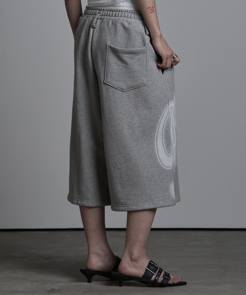 SAGGING FLARE BERMUDA PANTS MELANGE