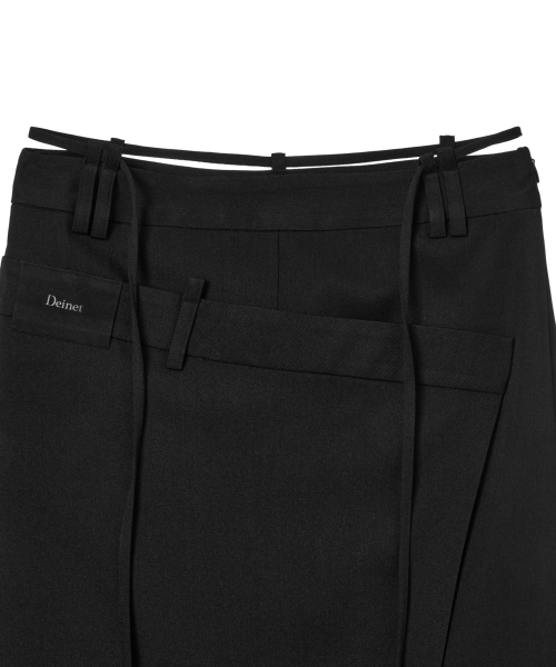 BELT LONG RAW SKIRT IN BLACK