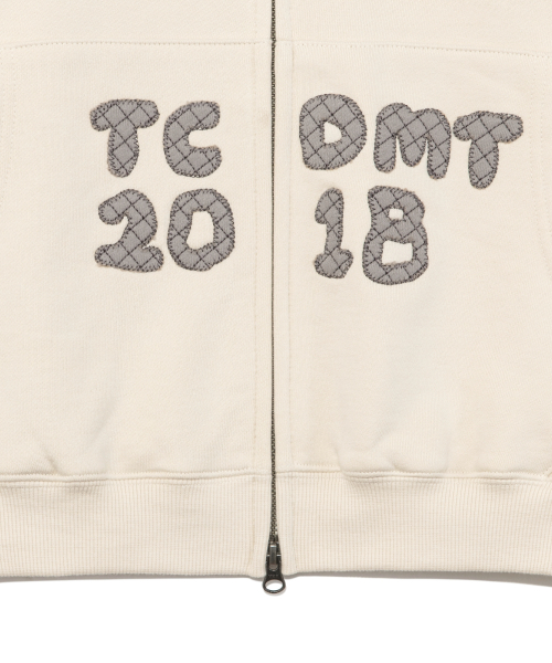 TCM logo applique hooded zip-up (oatmeal)