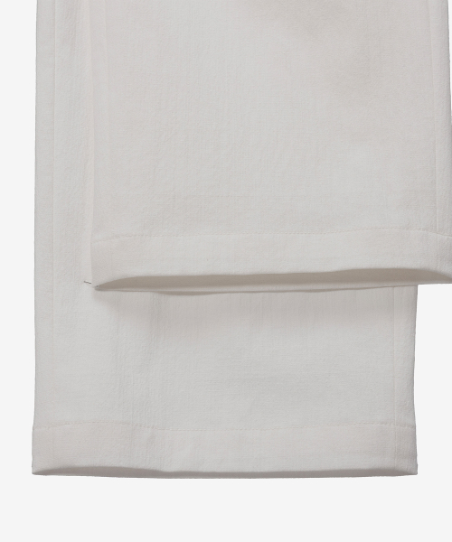White one tuck relaxes fit linen like banding pants