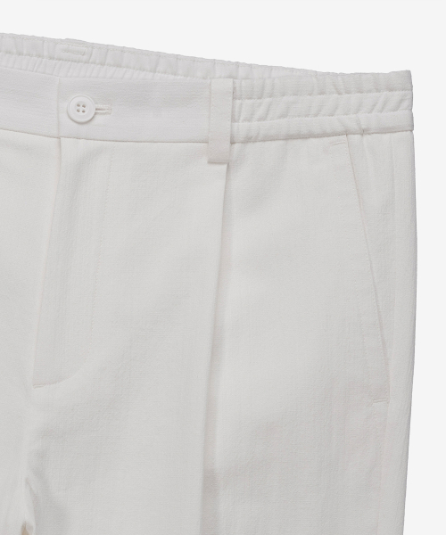 White one tuck relaxes fit linen like banding pants