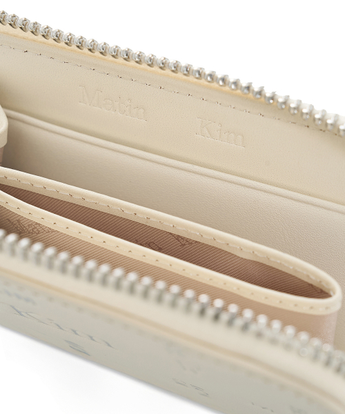 MATIN ALL-OVER LOGO HALF ROUND ZIP WALLET IN IVORY