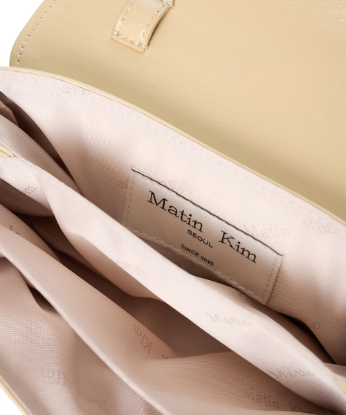 MULTI-POCKET MINI CROSS BAG IN LIGHT YELLOW
