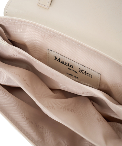 MULTI-POCKET MINI CROSS BAG IN IVORY