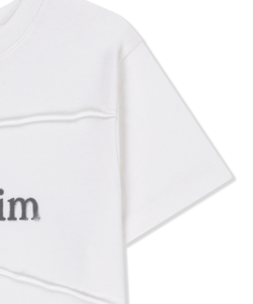 DIAGONAL CUT LOGO CROP TOP IN WHITE