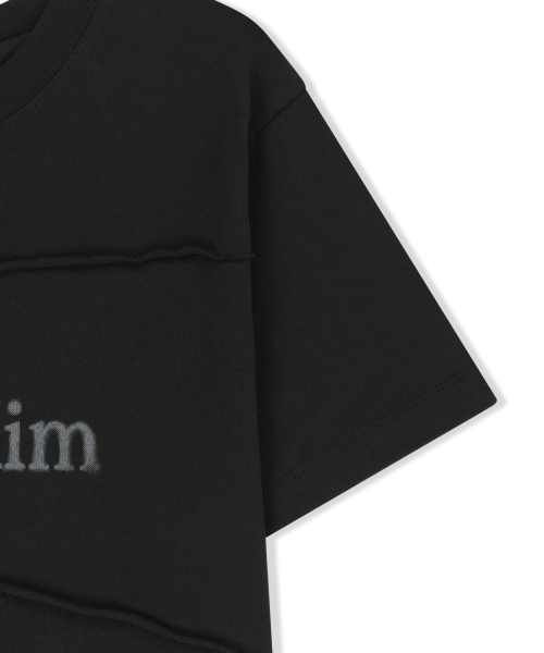 DIAGONAL CUT LOGO CROP TOP IN BLACK