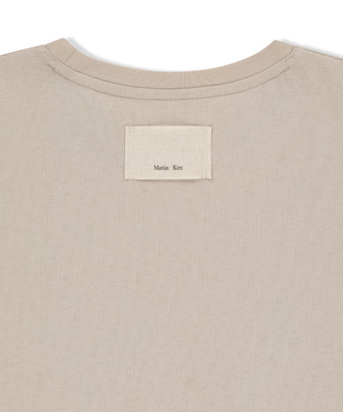 GRAFFITI ARTWORK LAYERED TOP IN BEIGE