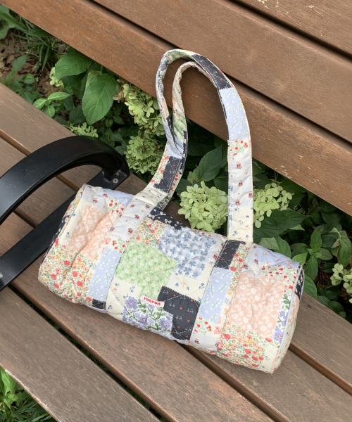 PATCHWORK QUILTED BARREL BAG