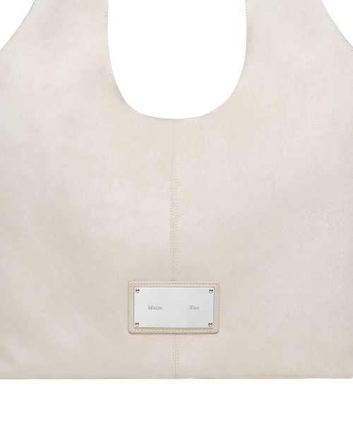 SIDE ZIP SUEDE SHOULDER BAG IN IVORY