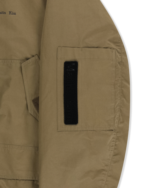 BUCKLE HIGH NECK UTILITY JUMPER IN KHAKI