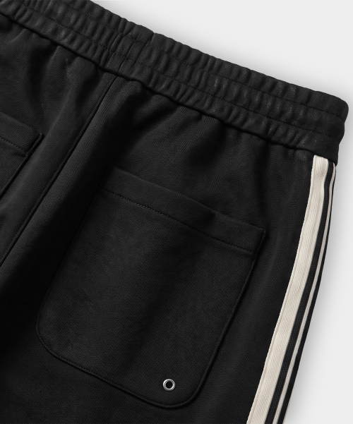VLAD ONE-TUCK CURVED TRACK PANTS_(3 SYMBOL JERSEY) BLACK&IVORY