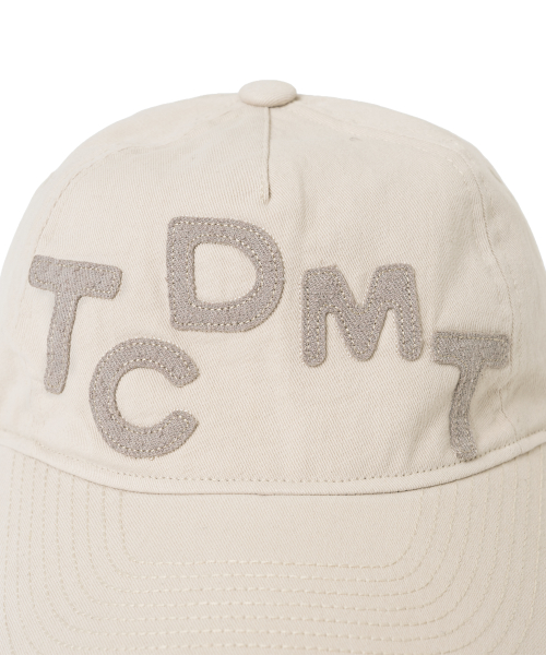 TCM logo typo cap (light grey)