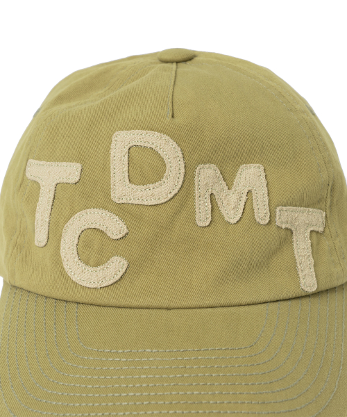 TCM logo typo cap (olive)