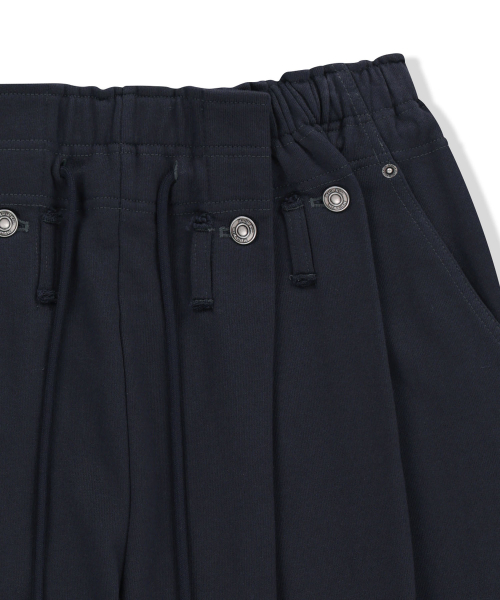 SNAP TUCK WASHED SWEATPANTS IN NAVY