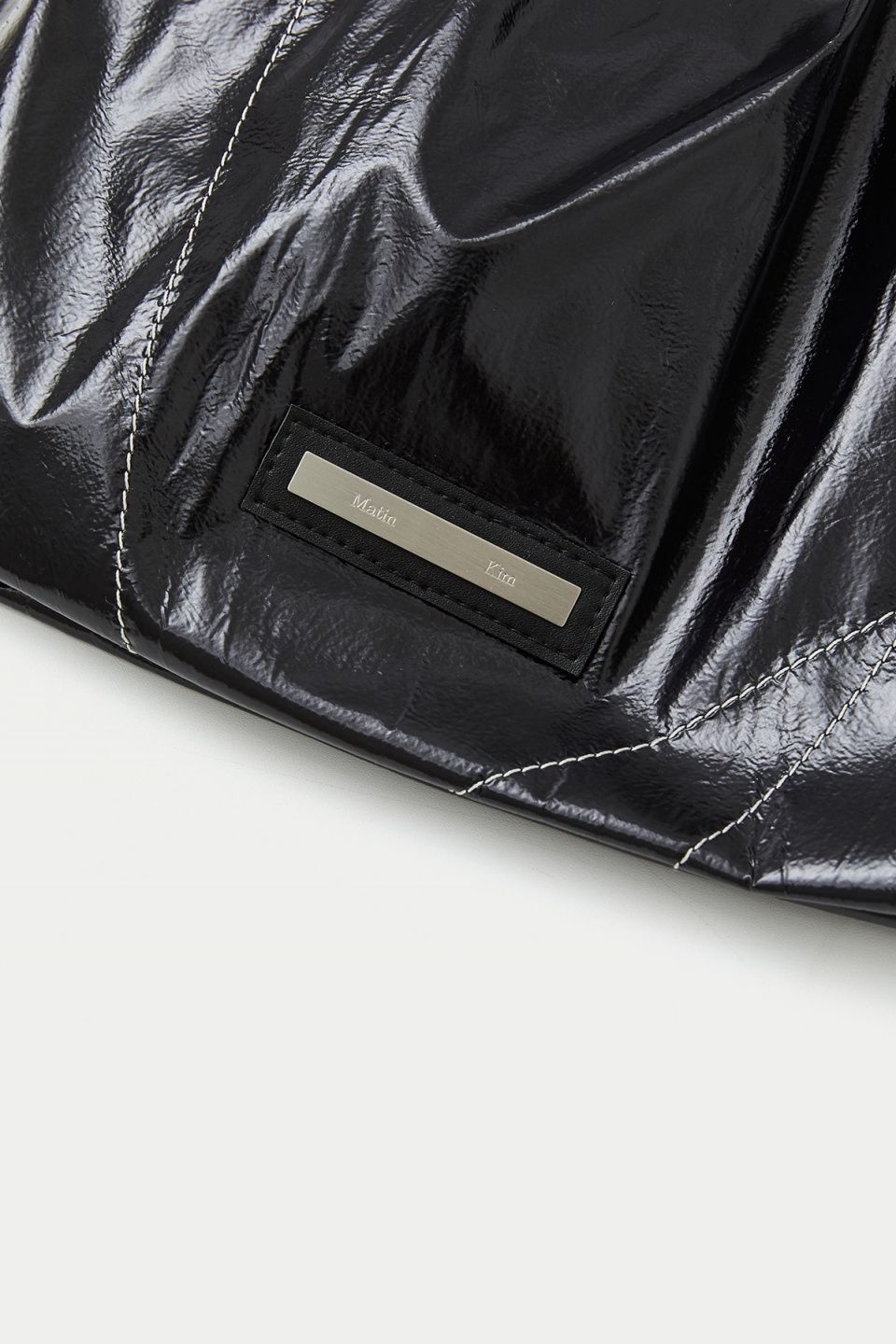 MUSINSA公式 | MATIN KIM STRING COATING BACK PACK IN BLACK